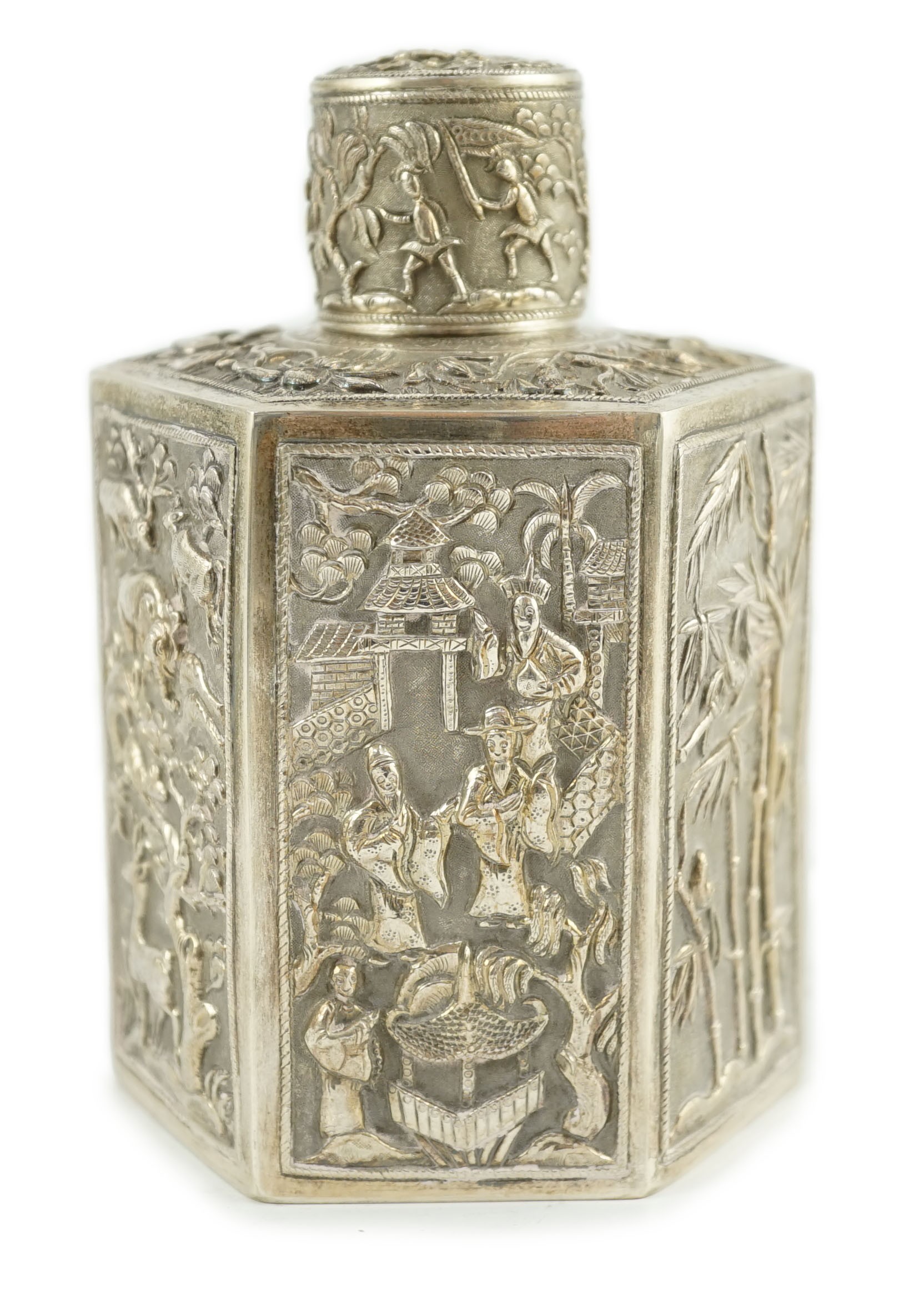 A late 19th century Chinese Export silver hexagonal tea caddy and cover, by Cumwo